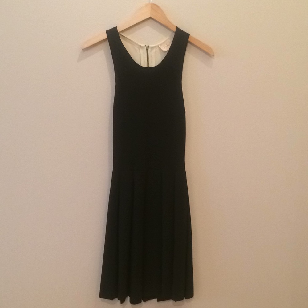 Parker black and white knit pleated dress. Used